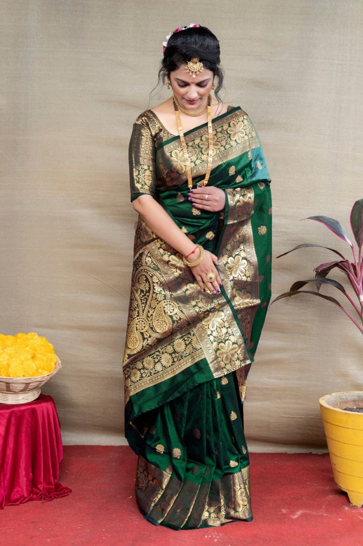 Prettiest Dark Green Banarasi Silk Saree With Assemblage Blouse Piece