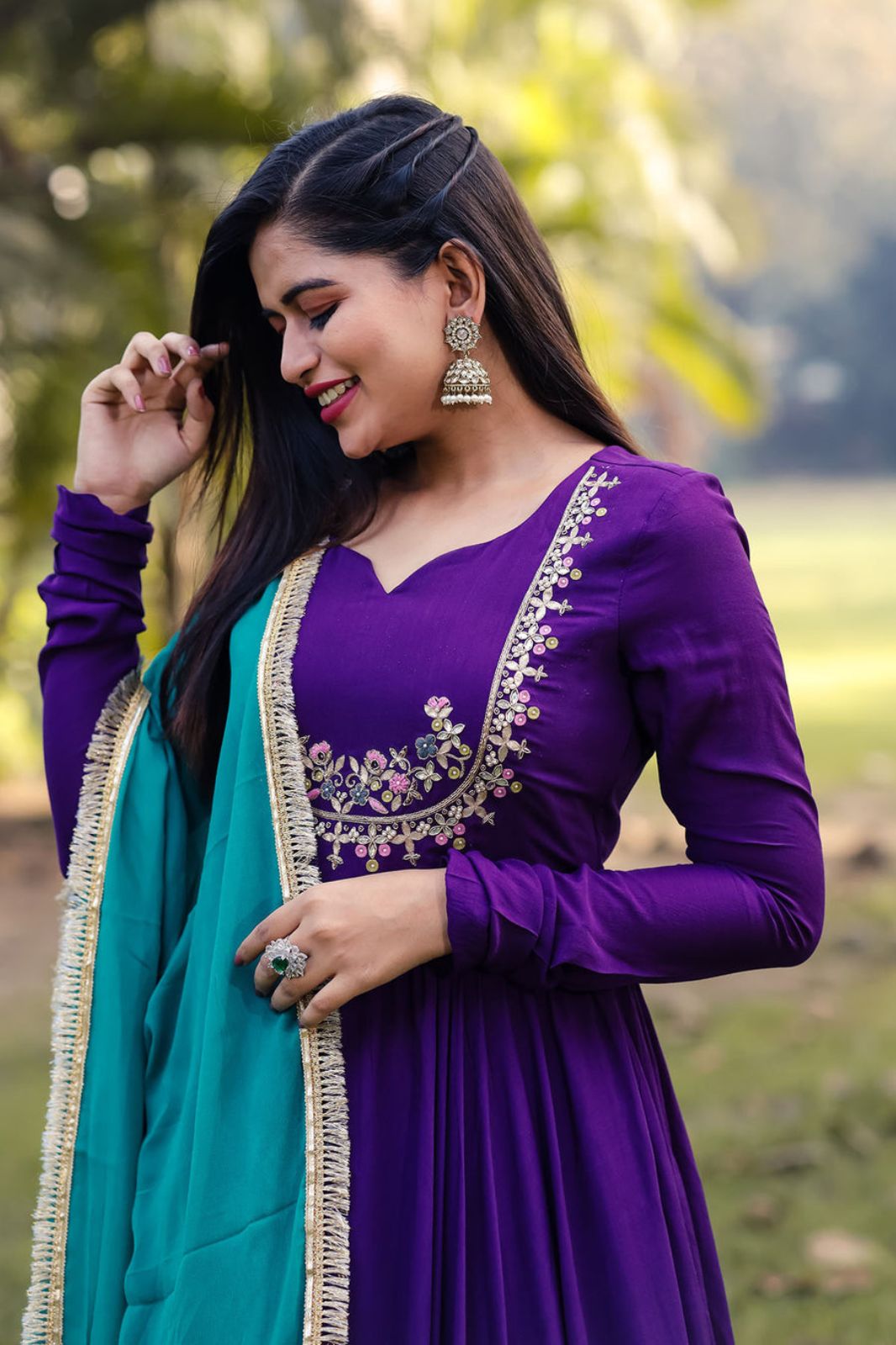 Purple color desinger Gown With Embroidery On Blouse