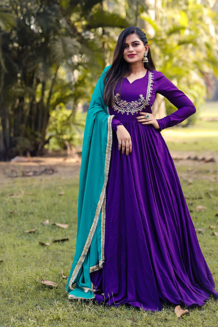 Purple color desinger Gown With Embroidery On Blouse
