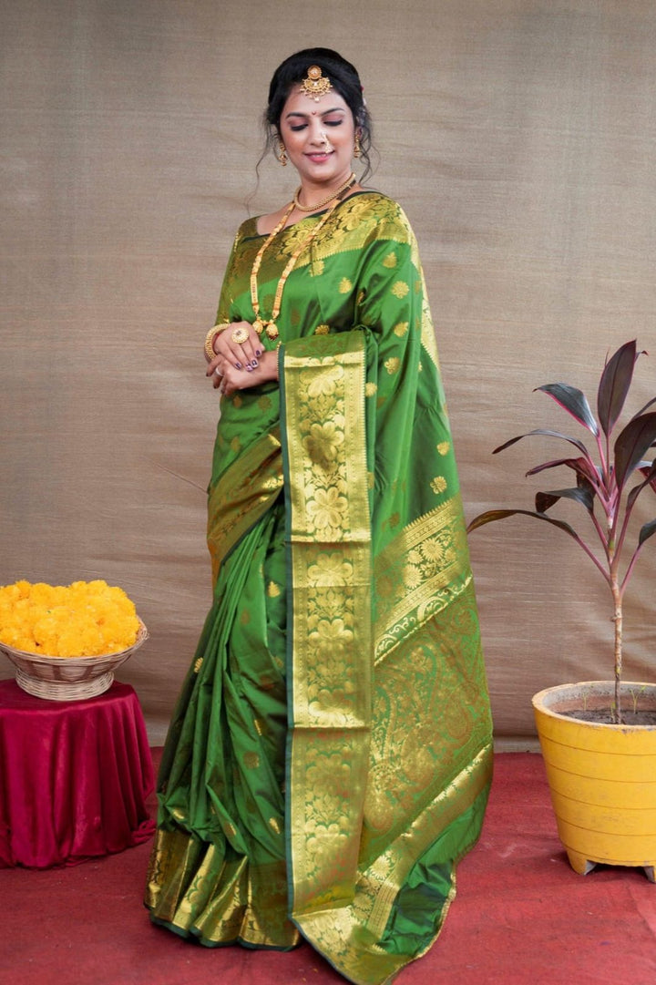 Preferable Green Banarasi Silk Saree With Blouse Piece