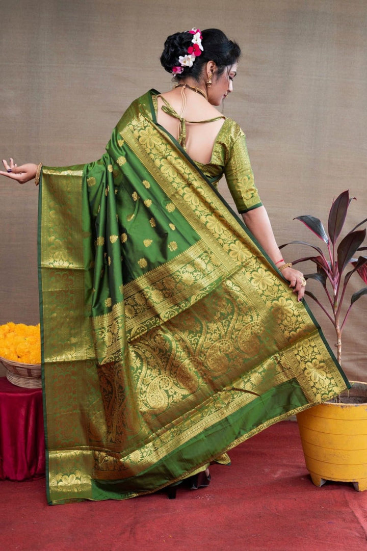 Preferable Green Banarasi Silk Saree With Blouse Piece